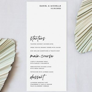 May include: A wedding menu featuring the names Daniel & Michelle and the date 12.30.2023. The menu lists starters, main course, and dessert options. The starters include toasted coconut chicken bites, sweet potato rounds topped with chives, and mini grilled sandwiches & tomato soup. The main course options are lightly seasoned trout with parsley vinaigrette and herb-roasted chicken & rice with fresh apricot. The dessert options are lavender wedding cake, strawberry & vanilla mousse, and peach blueberry cobbler.