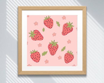 May include: A framed print with a pink background and a repeating pattern of red strawberries and pink flowers.