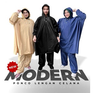May include: Three raincoats in beige, black, and blue with matching pants. The raincoats have hoods and button closures. The text "MODERN PONCO LENGAN CELANA" is printed below the raincoats.