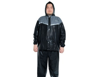 May include: A black and gray hooded raincoat with a zipper and snap closure. The raincoat has a reflective stripe on the chest and a reflective logo on the back.