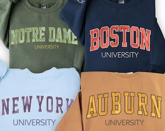 トップス Name. FAMILIANA UNIVERSITY SWEATSHIRT Name.（ネーム）の「FAMILIANA UNIVERSITY SWEATSHIRT with