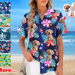 May include: A blue and white Hawaiian shirt with a floral pattern and images of dogs. The shirt has a button-up front and short sleeves.