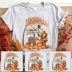 May include: A gray t-shirt with a fall-themed design featuring a scarecrow, a pumpkin patch, and a sign that reads "Mimi's Pumpkin Patch". The design also includes a small bird, a purple flower, and a variety of pumpkins. The names Tristan, Chloe, Sophia, Carter, Riley, Hunter, and Callie are written below the pumpkins.