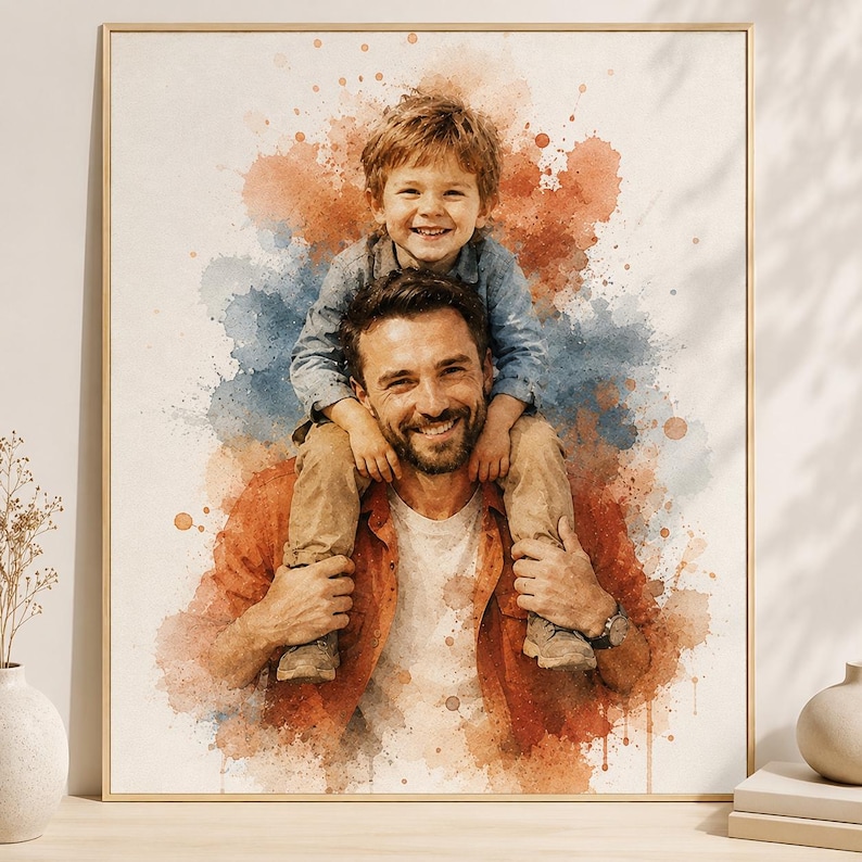 May include: Watercolor portrait of a father and child. The father, wearing an orange shirt, carries the child on his shoulders. The child is wearing a blue shirt and smiling. The background features orange and blue watercolor splashes, framed in a gold frame.