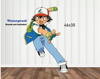 May include: A waterproof vinyl decal of a cartoon character, Ash Ketchum from the Pokemon anime, wearing a blue jacket, blue jeans, and a red and white baseball cap. The decal is 46 inches by 30 inches.