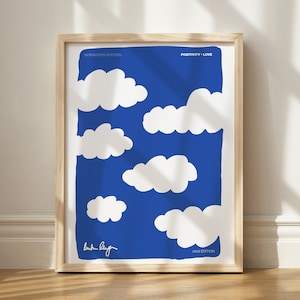 May include: A blue and white poster with the text "Inspiration Posters" and "Positivity + Love". The poster features a blue background with white clouds and the text "2022 Edition".