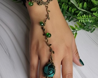 Black and green laced steampunk bracelet, ring, hand chain