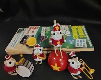 Set de regalo de 4 ratones: figuras de ratones tocando la tuba, el tambor, el maestro de ceremonias y la trompeta.