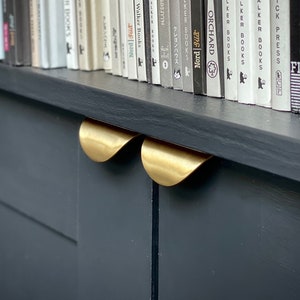 Lacquered brass curved cabinet pulls