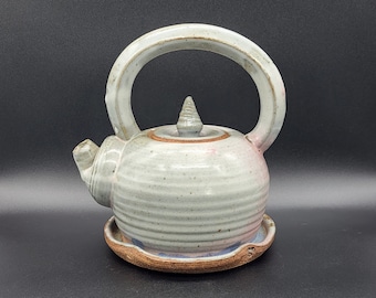 Sea shell Glaze Teapot with a Shell Shaped Handle on the Lid.  Handmade Teapot with Attached Plate - Handmade Wood Fired Teapot