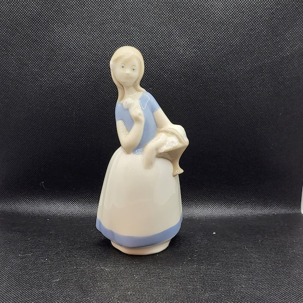 Spring Porcelain Lady Figurine.  Rex Valencia Hand made in spain.  one of the four seasons