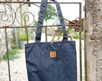 Einkaufstasche, handgemachte Tasche, umweltfreundliche Mode, nachhaltiger Stil, gewachste Canvas Tasche, nachhaltige Tasche, stilvolles Accessoire, Einkaufstasche