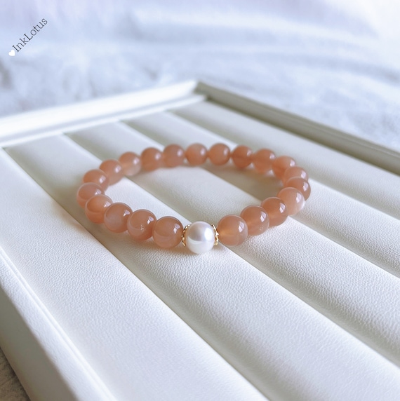 Choker Necklace with Peach Moonstone, Peach Aventurine Pendant and Dyed Green Cultured Freshwater Pearls Gold Tone Choker Necklace with Peach Moonstone, Peach Aventurine Pendant and Dyed Green Cultured Freshwater Pearls Gold Tone