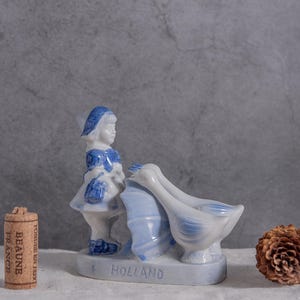Vintage Delft Blue Figurine: Dutch Girl with Geese, Holland Collectible