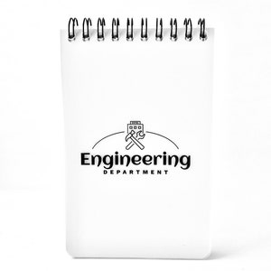 May include: White notepad with a black spiral binding. The notepad has a black and white logo that says "Engineering Department" with a graphic of a building and crossed wrenches.