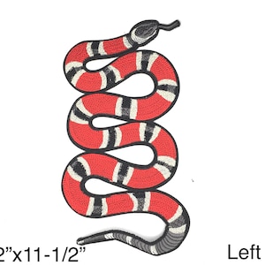 May include: Red and black embroidered snake patch, 5-1/2" x 11-1/2", with the word "Left" in the bottom right corner.