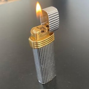 Christian Dior vintage collectable Lighter Swiss made Refurbished