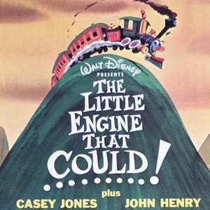 May include: A vintage Disneyland record album cover featuring a colorful illustration of a train climbing a green hill. The title "The Little Engine That Could" is prominently displayed, along with "Casey Jones" and "John Henry".