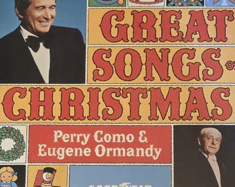 May include: Vintage vinyl record album cover for "Great Songs of Christmas" featuring Perry Como and Eugene Ormandy. The cover has a yellow background with red lettering and illustrations of Christmas symbols and portraits.