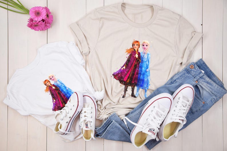 May include: A set of three ceramic mugs with a speckled, matte finish. The mugs are in shades of cream, light gray, and dark gray. Each mug has a simple, minimalist design and a rounded handle.