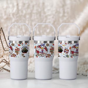 May include: Three white insulated tumblers with a handle and lid. Each tumbler features a colorful wrap-around design with cartoon characters, nautical elements, and the name "Olivia". The design includes a ship, life preservers, and other nautical themed graphics.