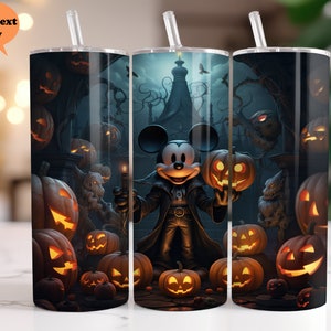 May include: A set of three stainless steel tumblers with a Halloween theme. The tumblers feature a black and white illustration of Mickey Mouse dressed as a vampire, surrounded by pumpkins and other Halloween imagery.