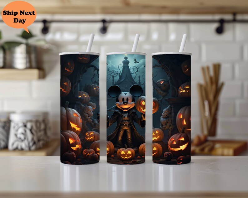 May include: Three black and white Halloween themed tumblers with Mickey Mouse dressed as a vampire holding a pumpkin. The tumblers feature a dark background with pumpkins and spooky trees.