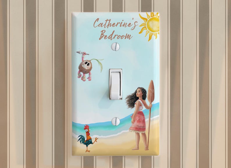 May include: A rectangular light switch plate featuring a beach scene with a cartoon girl holding a wooden paddle, a small rooster, and a coconut creature. The text "Catherine's Bedroom" is printed at the top with a yellow sun illustration.