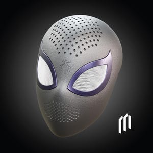 May include: A grey mask with a textured surface, featuring white eye openings outlined in purple. The mask has a perforated top and a spider emblem. The design is reminiscent of a superhero mask.