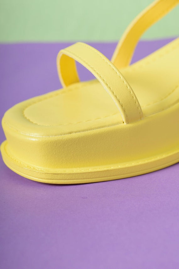 yellow platform flip flops