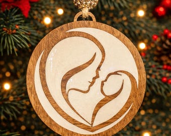 Decorazione natalizia in legno a forma di latte materno, ricordo della maternità, tappa fondamentale dell'allattamento al seno.