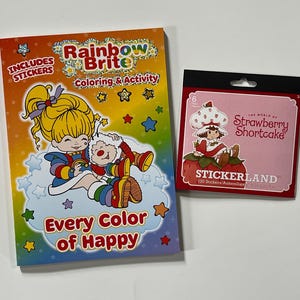 Rainbow Brite colour and activity book with Strawberry Shortcake sticker pad