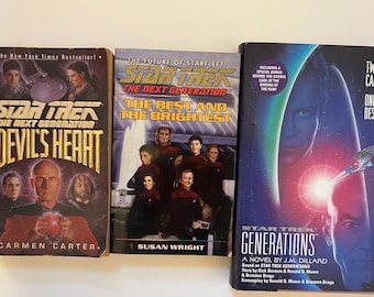 May include: Three Star Trek novels are displayed: "The Devil's Heart", "The Best and the Brightest", and "Generations". The covers feature images of the characters and the Star Trek logo. The "Generations" novel includes a special bonus behind-the-scenes look at the making of the film.