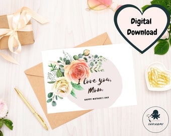 May include: Printable Mother's Day card featuring a watercolor floral design with peach and white flowers, green leaves, and the text "I love you, Mom Happy Mother's Day".