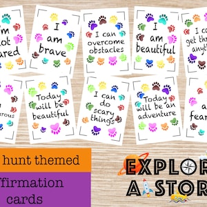 May include: Ten affirmation cards with colorful paw prints and positive messages. The cards are designed for a bear hunt theme. The text on the cards includes: "I'm not scared", "I am brave", "I can overcome obstacles", "I am beautiful", "I can get through anything", "I am adventurous", "Today will be beautiful", "I can do scary things", "Today will be an adventure", and "I am fearless".