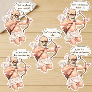 May include: A set of five stickers featuring a cartoon of Sigmund Freud as Cupid, holding a bow and arrow. Each sticker has a speech bubble with phrases like "Tell me about your mother" and "Love is a defense mechanism."