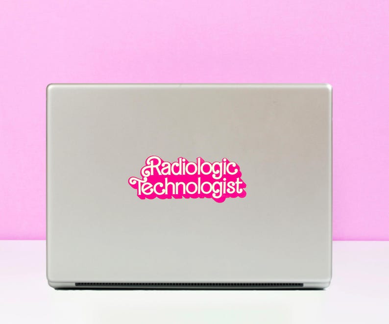May include: A silver laptop with a pink sticker that says "Radiologic Technologist" in a retro font.