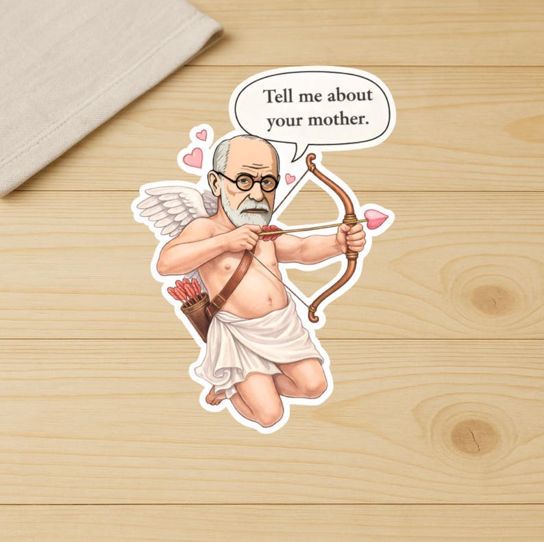 May include: A sticker featuring a cartoon of Sigmund Freud as Cupid, holding a bow and arrow with a heart-shaped tip. The speech bubble says, "Tell me about your mother." The image includes wings, a quiver of arrows, and pink hearts.