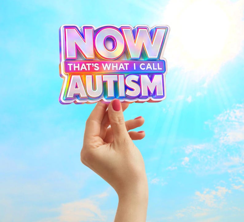 May include: A colorful sticker with the text "NOW That's What I Call AUTISM" is held up against a bright blue sky. The sticker has a rainbow gradient and a 3D effect. The hand holding the sticker has red nail polish.