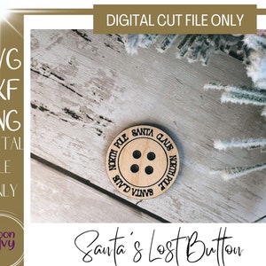 May include: A wooden button with four holes and the words "North Pole" and "Santa Claus" engraved around the edge. The text "Santa's Lost Button" is below the button. The image also includes the text "SVG, DXF, PNG, DIGITAL FILE ONLY".