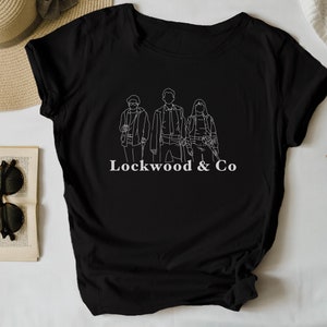 Lockwood and Co merch unisex t-shirt top Anthony Lockwood Lucy Carlyle George karim tv show