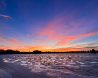 Warm Winter Sky above Frozen Pond