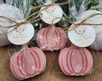 May include: Pink pumpkin shaped soap favors with a floral design and the text "Sophia's Baby Shower" on a white tag. Thank you for celebrating with us.