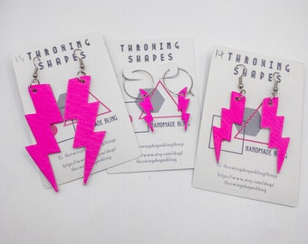 Neon pink and silver  Bowie lightening bolt earrings, handmade leather earrings.