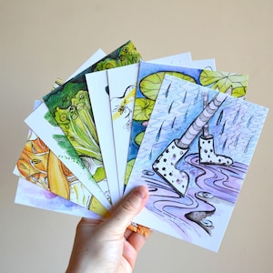 Lot de 8 cartes postales différentes. Art mignon et coloré. Imprimé. R6.