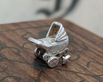 Unisex silver vintage antique baby carriage movable wheel tiny charm