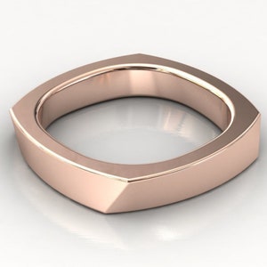 May include: A rose gold square shaped band ring with a smooth, polished finish.