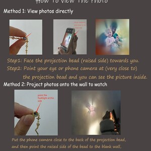May include: A close-up of a small, gold-colored pendant with a clear glass bead that projects an image when held up to a light source. The pendant is on a chain and has a small, purple gemstone.