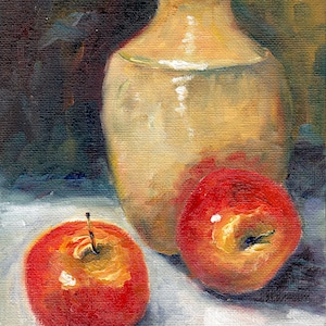 May include: A still life painting depicting a beige ceramic vase and two red apples on a white surface. The vase is round and has a wide mouth. The apples are shiny and have a slight yellow tint. The background is a dark brown colour.