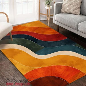 May include: Abstract area rug with a wavy design in shades of yellow, orange, red, blue, and green. The rug has a modern, geometric pattern.